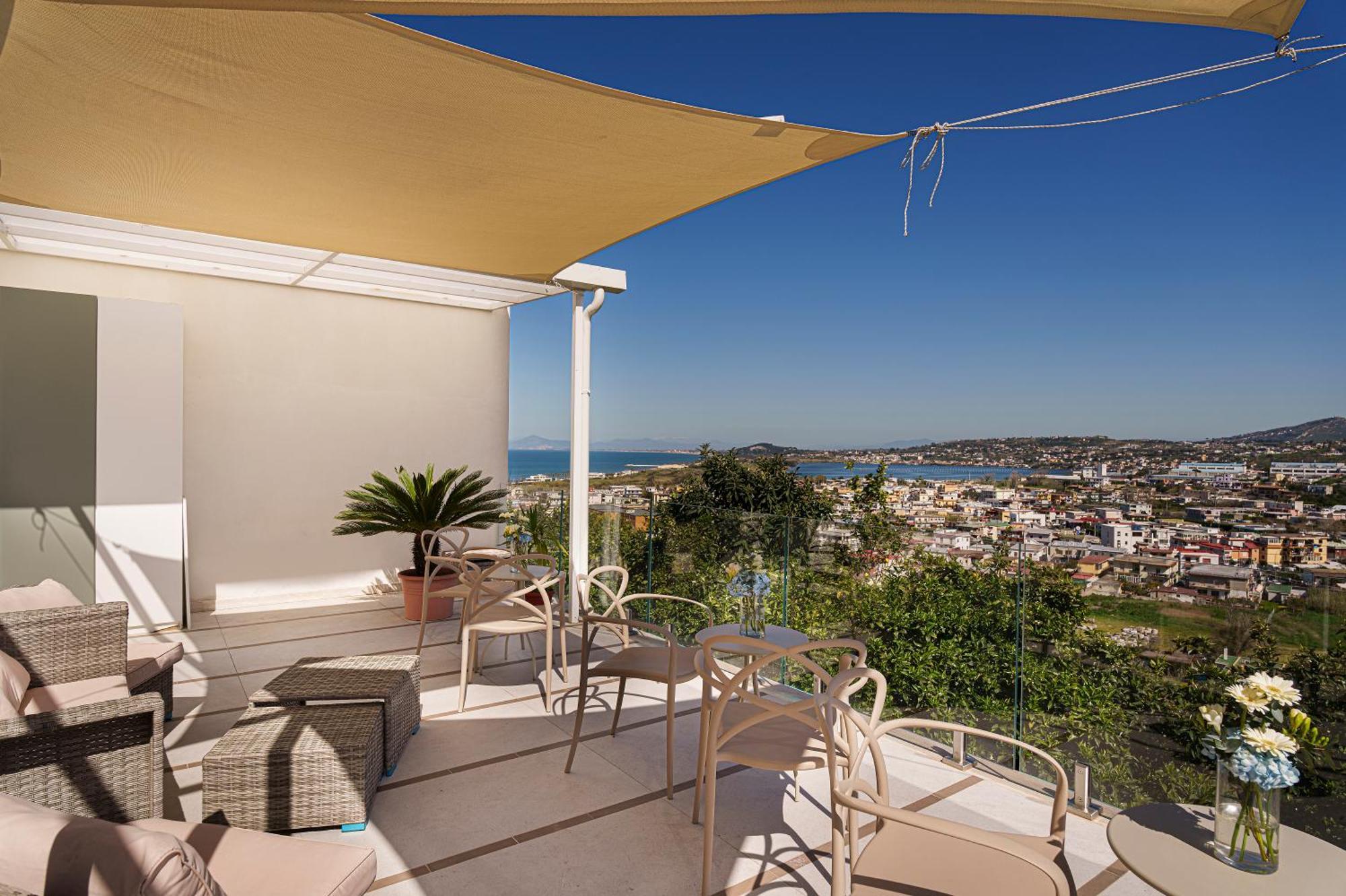 Uefio - Luxury Suites Monte di Procida Bagian luar foto